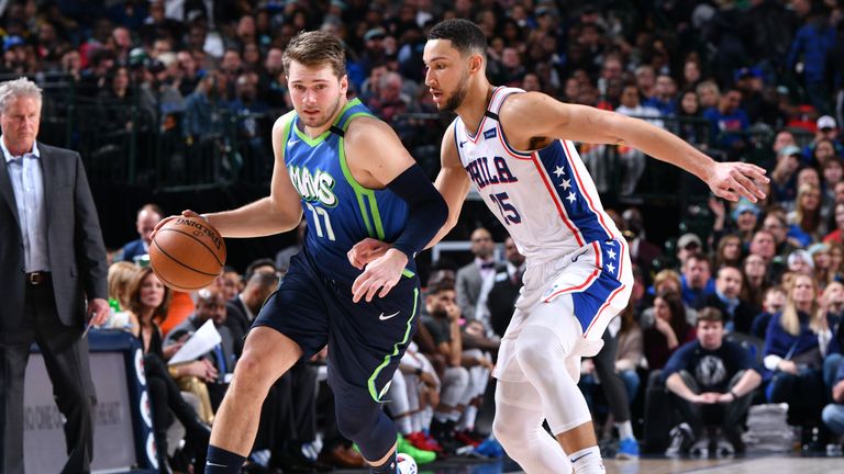 Luka Doncic #77 of the Dallas Mavericks handles the ball while Ben Simmons #25 of the Philadelphia 76ers plays defense during the game on January 11, 2020 at the American Airlines Center in Dallas, Texas.