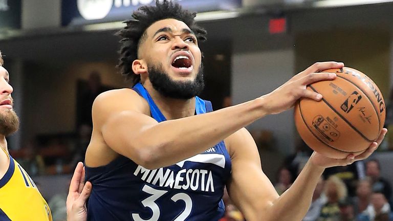 Karl-Anthony Towns heads to the basket against the Indiana Pacers