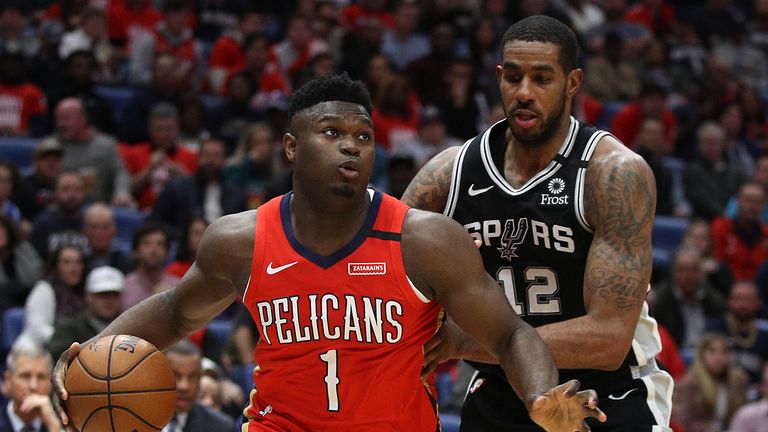 Zion Williamson #1 of the New Orleans Pelicans drives the ball around LaMarcus Aldridge #12 of the San Antonio Spurs at Smoothie King Center on January 22, 2020 in New Orleans, Louisiana.