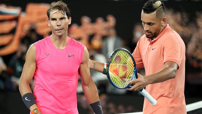 Nick Kyrgios of Australia (R) shakes hands with Rafael Nadal of Spain at the net following their Men's Singles fourth round match on day eight of the 2020 Australian Open at Melbourne Park on January 27, 2020 in Melbourne, Australia