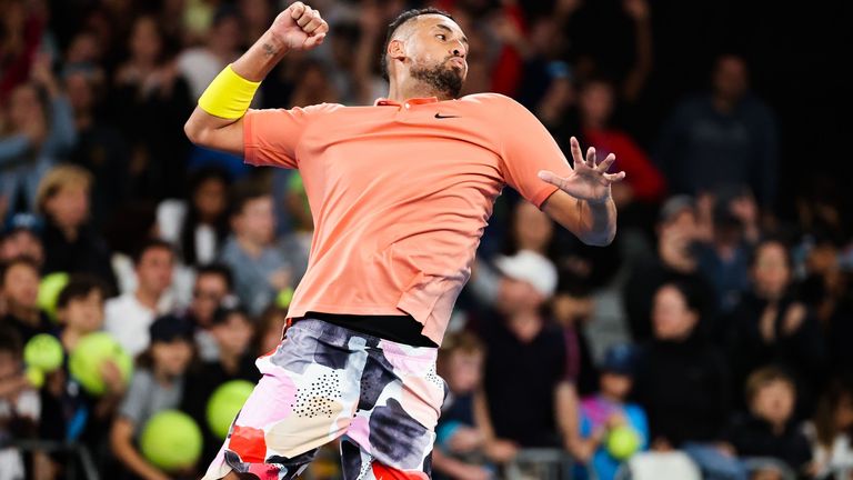 Australia's Nick Kyrgios celebrates after victory against France's Gilles Simon during their men's singles match on day four of the Australian Open tennis tournament in Melbourne on January 23, 2020