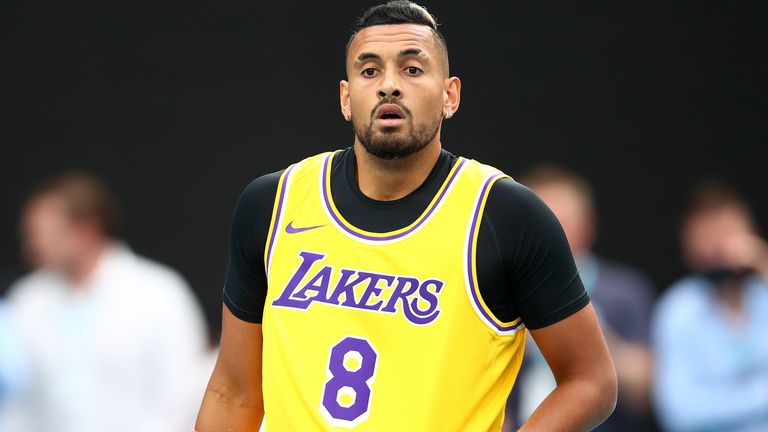 Nick Kyrgios of Australia tears up as he walks onto Rod Laver Arena wearing a number 8 Kobe Bryant Jersey ahead of his Men's Singles fourth round match against Rafael Nadal of Spain on day eight of the 2020 Australian Open at Melbourne Park on January 27, 2020 in Melbourne, Australia.