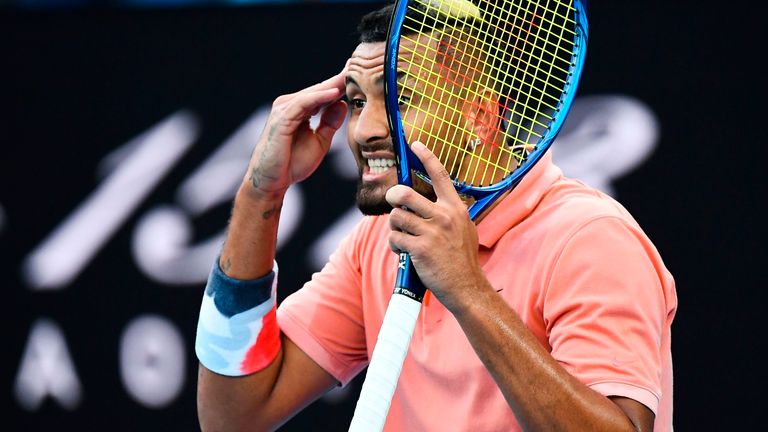 Australia's Nick Kyrgios reacts after a point against Spain's Rafael Nadal during their men's singles match on day eight of the Australian Open tennis tournament in Melbourne on January 27, 2020