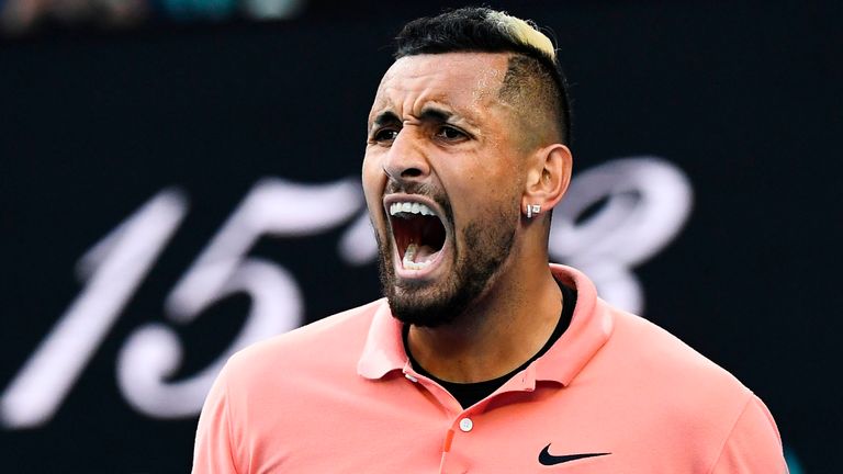 Australia's Nick Kyrgios reacts after a point against Spain's Rafael Nadal during their men's singles match on day eight of the Australian Open tennis tournament in Melbourne on January 27, 2020.