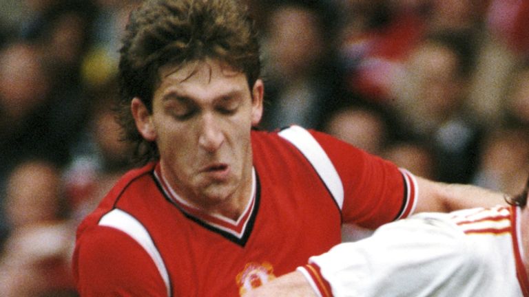 MANCHESTER, UNITED KINGDOM - OCTOBER 09:  Steve Nicol of Liverpool is challenged by Norman Whiteside of Manchester United during a First Divsion match at Old Trafford on October 9, 1985 in Manchester, England. (Photo by Mike King/Allsport/Getty Images) *** Local Caption *** Norman Whiteside; Steve Nicol