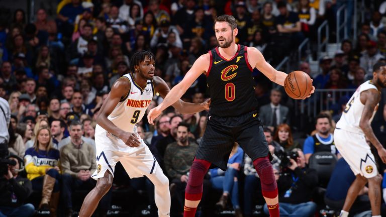 Kevin Love #0 of the Cleveland Cavaliers handles the ball against the Denver Nuggets on January 11, 2020 at the Pepsi Center in Denver, Colorado
