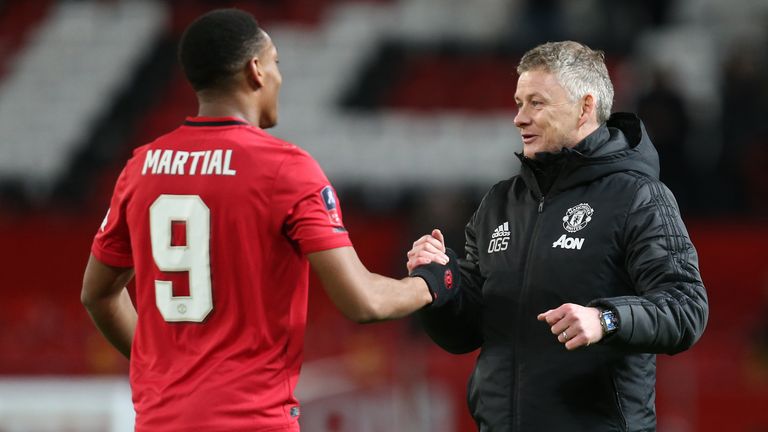 Ole Gunnar Solskjaer embraces Martial after overseeing Wolves on Wednesday
