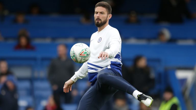 Olivier Giroud warms up ahead of an FA Cup tie against Nottingham Forest
