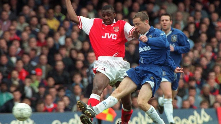 Chelsea's Paul Hughes competes for the ball with Arsenal's Patrick Vieira