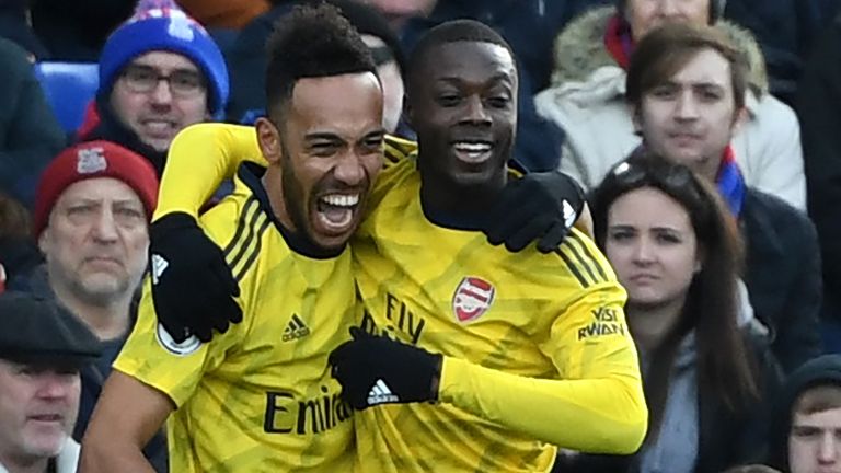 Pierre-Emerick Aubameyang celebrates his goal with Nicolas Pepe