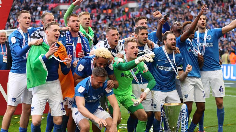 Portsmouth players celebrate winning the Checkatrade Trophy at Wembley in 2019