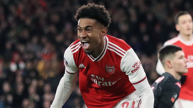 Reiss Nelson celebrates scoring for Arsenal against Leeds in FA Cup