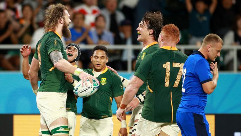 RG Snyman of South Africa celebrates with teammates after scoring his team's sixth try during the Rugby World Cup 2019 Group B game between South Africa v Italy at Shizuoka Stadium Ecopa on October 04, 2019 in Fukuroi, Shizuoka, Japan. 