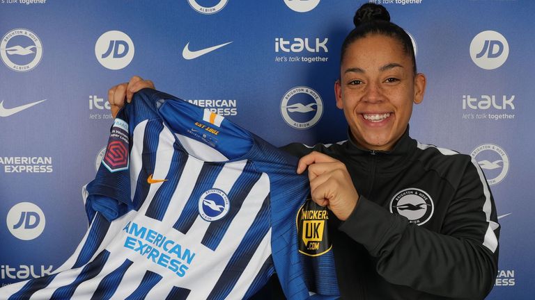 Rianna Jarrett poses with a Brighton and Hove Albion Women shirt after signing for them (Pic courtesy of BHAFC)