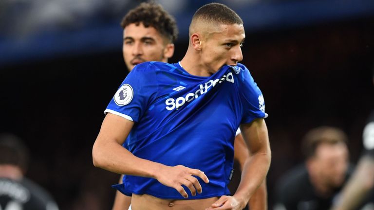 Richarlison celebrates after scoring the opening goal of the game between Everton and Brighton