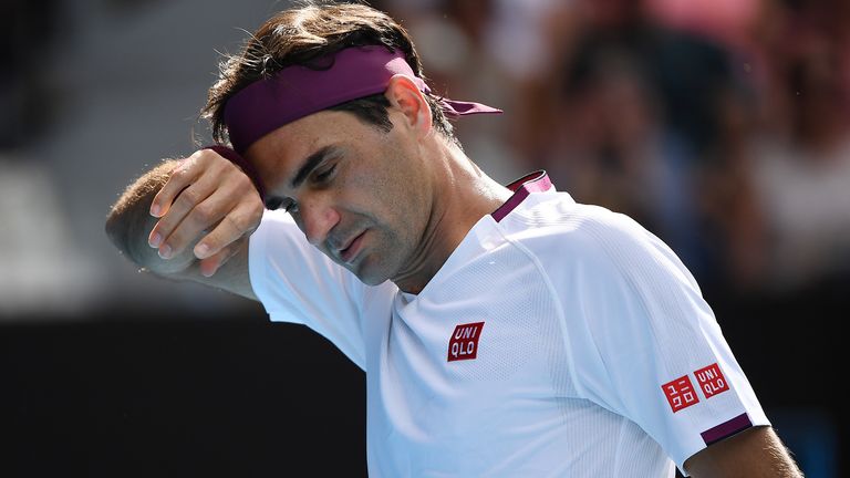 Roger Federer of Switzerland looks on during his Men’s Singles Quarterfinal match against Tennys Sandgren of the United States on day nine of the 2020 Australian Open at Melbourne Park on January 28, 2020 in Melbourne, Australia