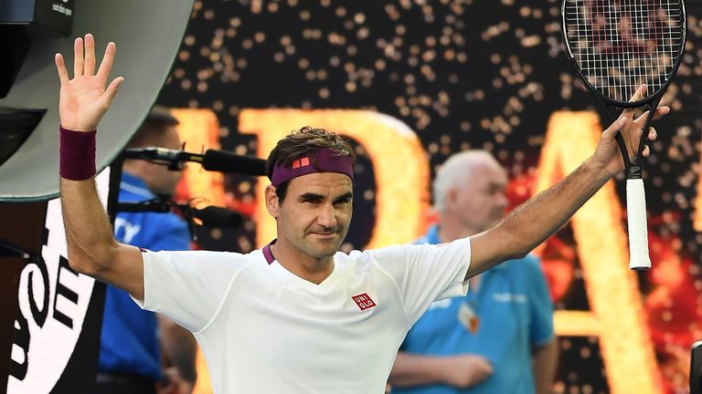 Switzerland's Roger Federer celebrates after victory against Tennys Sandgren of the US during their men's singles quater-final match on day nine of the Australian Open tennis tournament in Melbourne on January 28, 2020.