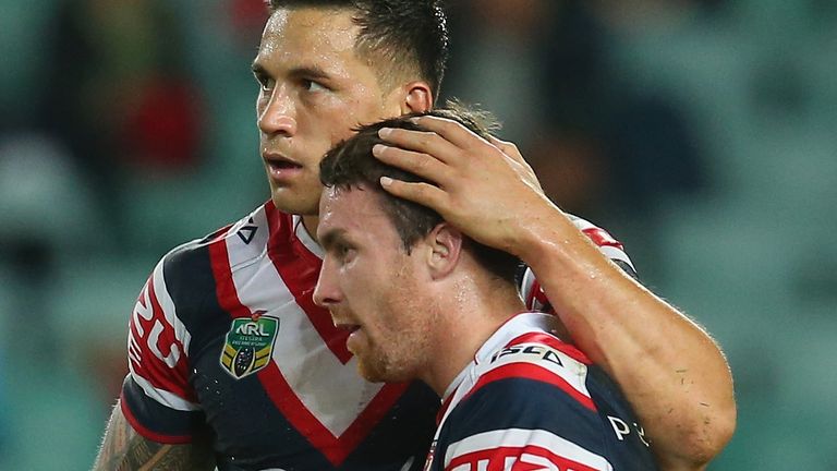 Sonny Bill Williams and James Maloney pictured playing for Sydney Roosters in 2014