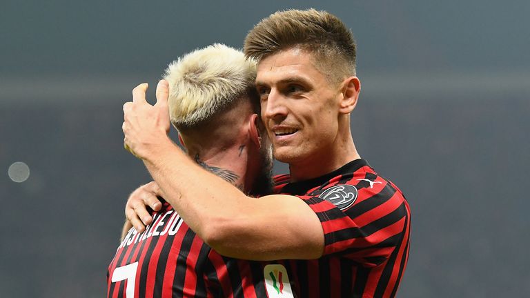 Samuel Castillejo celebrates after scoring AC Milan's second goal with Krzysztof Piatek
