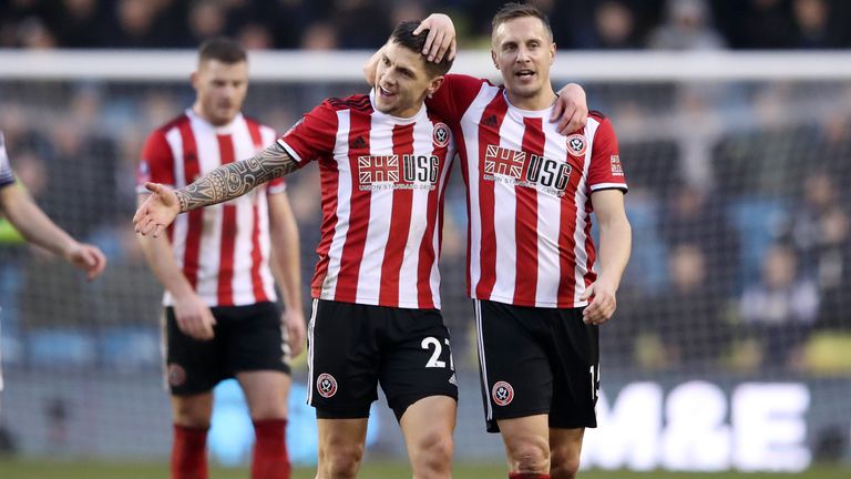 Mo Besic celebrates with Phil Jagielka