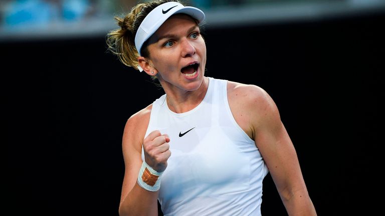 Romania's Simona Halep reacts after a point against Jennifer Brady of the US during their women's singles match on day two of the Australian Open tennis tournament in Melbourne on January 21, 2020.