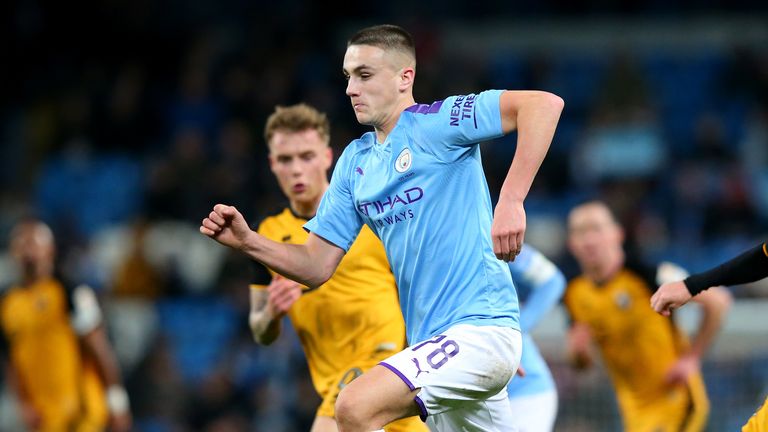 Taylor Harwood-Bellis of Manchester City runs with the ball during the FA Cup Third Round win over Port Vale at the Etihad Stadium