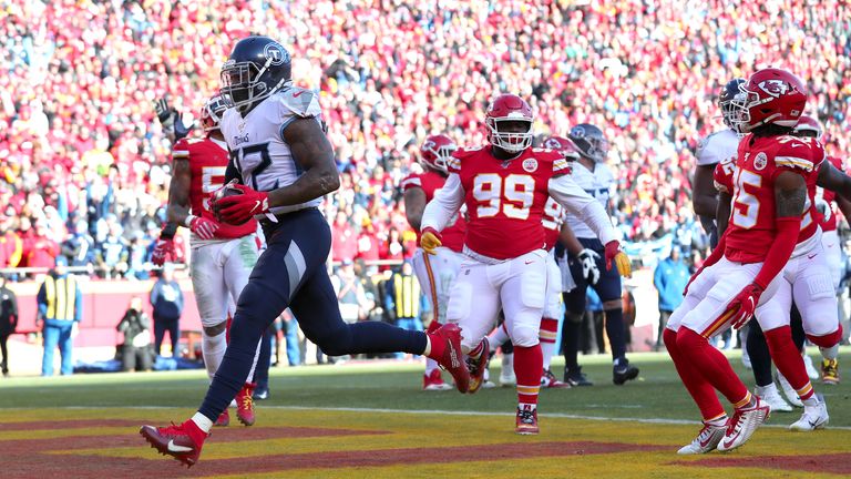 Derrick Henry #22 of the Tennessee Titans runs in a 4 yard touchdown in the first quarter against the Kansas City Chiefs in the AFC Championship Game at Arrowhead Stadium