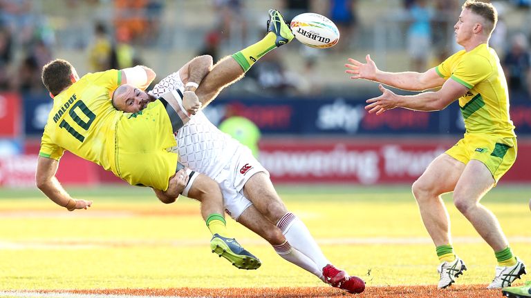 HAMILTON, NEW ZEALAND - JANUARY 26: Tom Bowen of England tackles Nick Malouf of Australia during the bronze match between Australia and England at the 2020 HSBC Sevens at FMG Stadium Waikato on January 26, 2020 in Hamilton, New Zealand. (Photo by Hagen Hopkins/Getty Images)