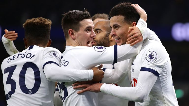 Delle Alli celebrates scoring his first half opener against Norwich with his Tottenham team-mates