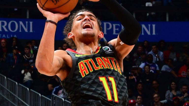 Tare Young shoots a fadeaway against the Philadelphia 76ers