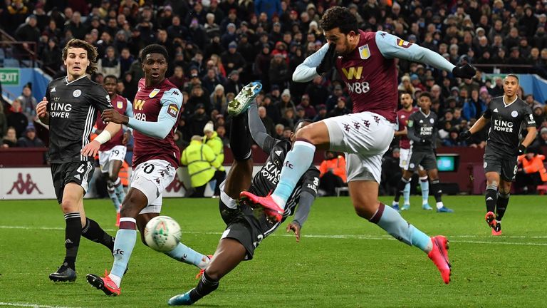 Aston Villa's Egyptian midfielder Trezeguet scores his team's second goal during the English League Cup semi-final second leg football match between Aston Villa and Leicester City at Villa Park in Birmingham, central England on January 28, 2020. - Aston Villa won the match 2-1. (