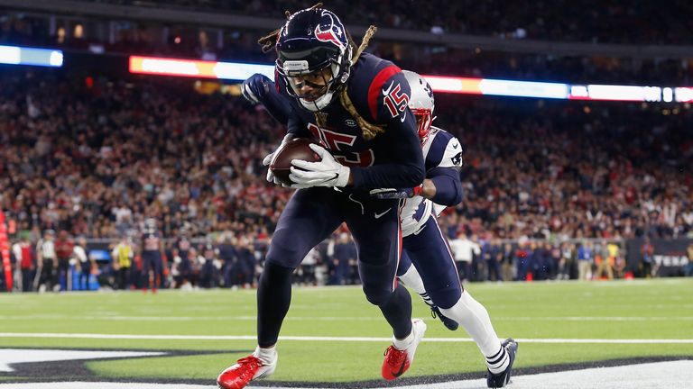 Fuller comes down for a touchdown against the New England Patriots