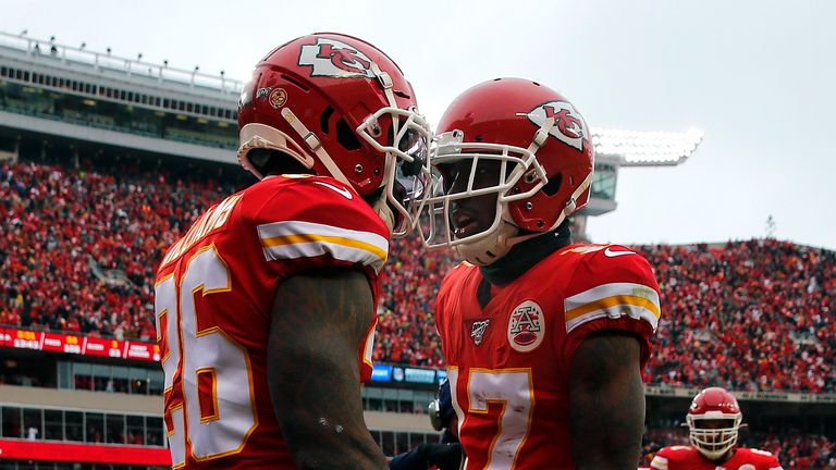 Damien Williams #26 of the Kansas City Chiefs celebrates his 17-yard touchdown reception with Mecole Hardman #17 against the Houston Texans