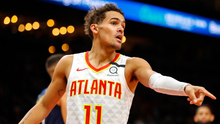 Trae Young of the Atlanta Hawks reacts during the first half of an NBA game against the Denver Nuggets