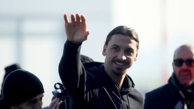 Newly appointed AC Milan forward Zlatan Ibrahimovic waves upon his arrival at Linate airport, on January 2, 2020. - Ibrahimovic has signed with AC Milan on a six-month deal, promising to help rescue the struggling Serie A outfit&#39;s season. The 38-year-old will undergo his medical on January 2 and will hold his first press conference the following day.
