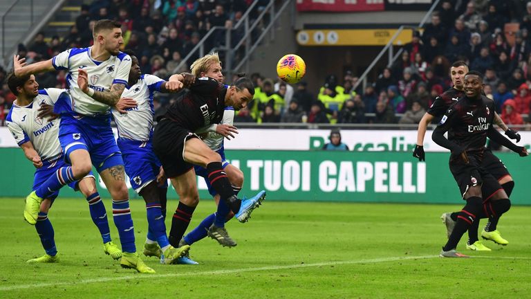 Ibrahimovic is surrounded by Sampdoria players as he goes for a header