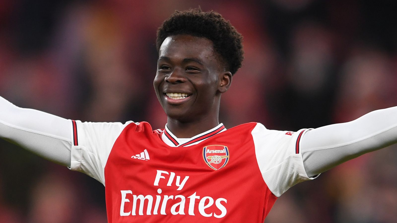The 21-year old son of father (?) and mother(?) Bukayo Saka in 2023 photo. Bukayo Saka earned a 0.45 million dollar salary - leaving the net worth at  million in 2023