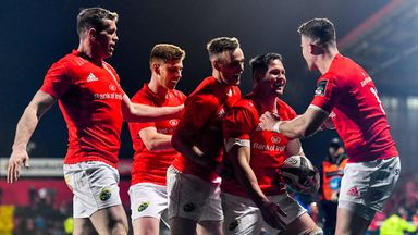 Arno Botha celebrates a try with his Munster team-mates