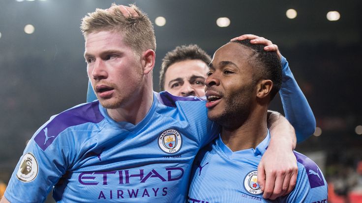 Kevin De Bruyne and Raheem Sterling celebrate during Manchester City's game against Wolves at Molineux