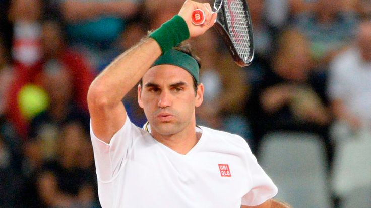 Switzerland's Roger Federer plays a return to Spain's Rafael Nadal during their tennis match at The Match in Africa at the Cape Town Stadium, in Cape Town on February 7, 2020. 