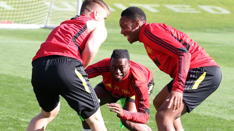 Aaron Wan-Bissaka, Anthony Martial and Luke Shaw in training 