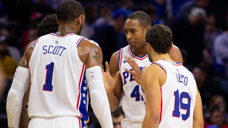 Al Horford offers advice to 76ers bench players Mike Scott and Raul Neto