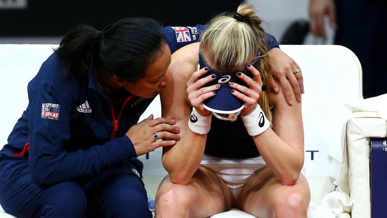 Great Britain Captain Anne Keothavong consoles Harriet Dart after she loses her womens singles match against Anna Karolína Schmiedlova of Slovakia during the Fed Cup Qualifier match between Slovakia and Great Britain at AXA Arena NTC on February 8, 2020 in Bratislava, Slovakia