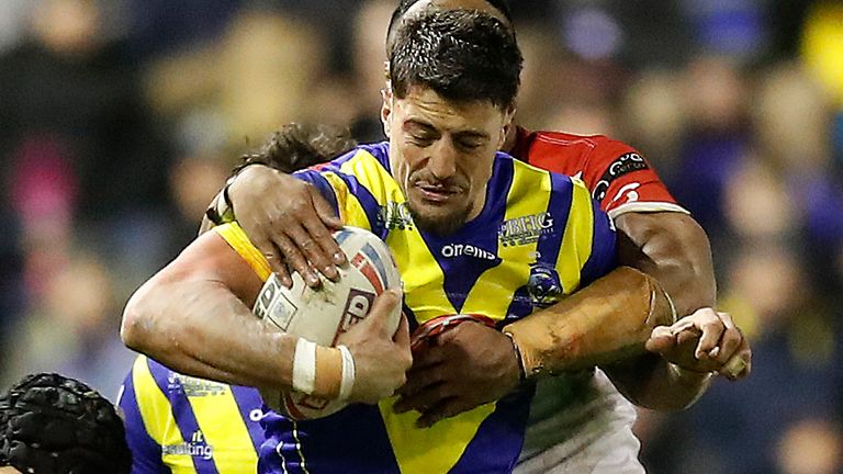 Warrington Wolves' Anthony Gelling is tackled by St Helens Saints' Jonny Lomax (left) and Dominique Peyroux (right)during the Betfred Super League match at The Halliwell Jones stadium, Warrington. PA Photo. Picture date: Thursday February 6, 2020. See PA story RUGBYL Warrington. Photo credit should read: Martin Rickett/PA Wire. RESTRICTIONS: Editorial use only. No commercial use. No false commercial association. No video emulation. No manipulation of images.