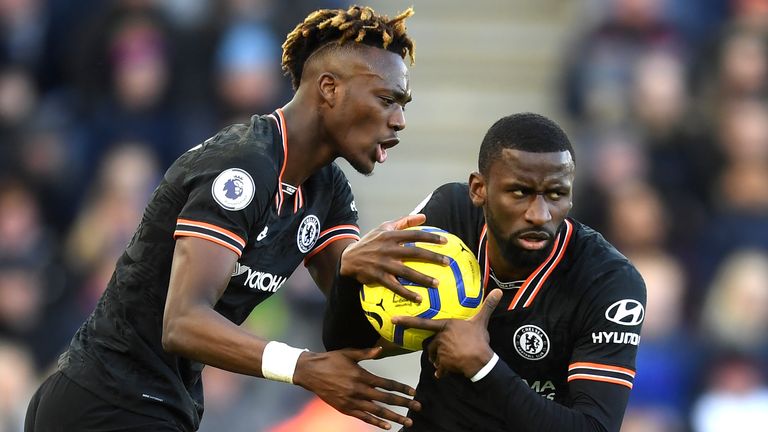 Antonio Rudiger collects the match ball following his equaliser 