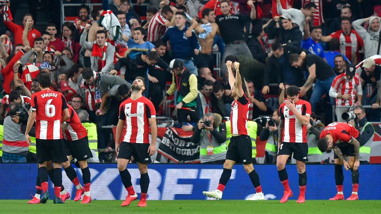Athletic Bilbao fans and players celebrate the last-gasp win