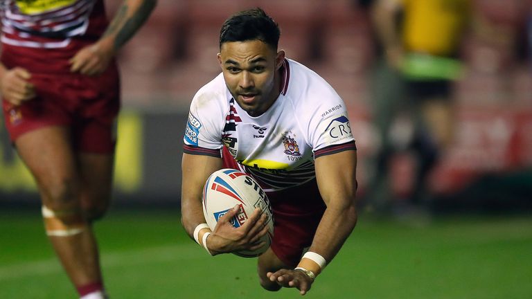 Wigan Warriors' Bevan French goes over for a try against Toronto Wolfpack during the Betfred Super League match at DW Stadium, Wigan. PA Photo. Picture date: Thursday February 13, 2020. See PA story RUGBYL Wigan. Photo credit should read: Martin Rickett/PA Wire. RESTRICTIONS: Editorial use only. No commercial use. No false commercial association. No video emulation. No manipulation of images.                  