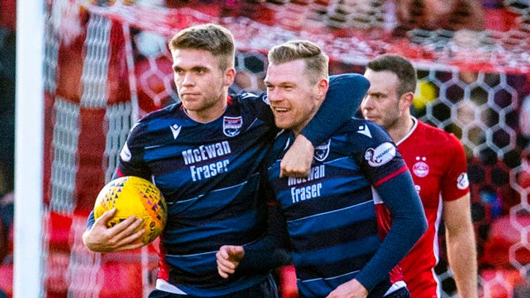 Billy McKay celebrates after netting Ross County's second goal against Aberdeen