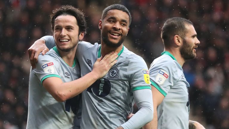 Dominic Samuels and Lewis Travis of Blackburn Rovers celebrate a goal against Charlton