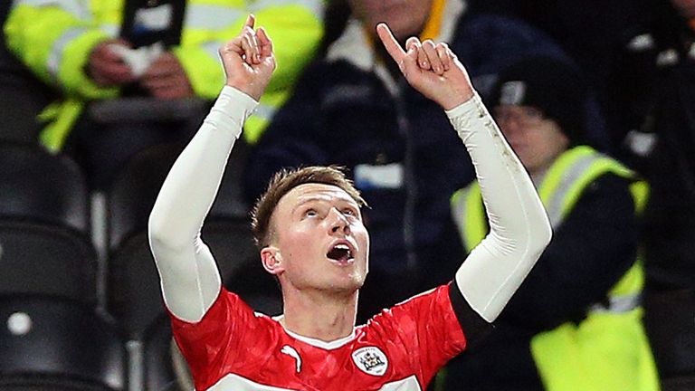 Barnsley's Cauley Woodrow celebrates scoring his side's first goal of the game